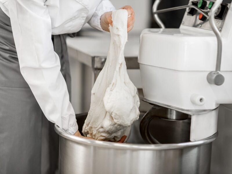 what effect does overmixing a dough or batter generally have